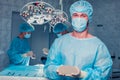 Team surgeon at work in operating room. breast augmentation. Royalty Free Stock Photo