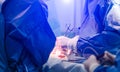 Team surgeon at work in operating room. Closeup of doctors' hands. Process of surgery operation using medical Royalty Free Stock Photo