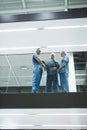 Team of surgeons discussing x-ray in corridor Royalty Free Stock Photo