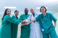 A team of surgeons in the operating room . A team of doctors standing in a hospital. Group of doctors wearing masks in front of th Royalty Free Stock Photo