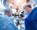 A team of surgeons performing brain surgery to remove a tumor. Royalty Free Stock Photo