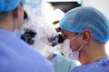 Treatment of a brain aneurysm. Surgical operation on the brain. A team of surgeons performing brain surgery to remove a tumor Royalty Free Stock Photo