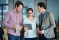 Team talking tablet or business people with research in group meeting or discussion together in office. Diversity Royalty Free Stock Photo