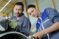 team technicians working together Royalty Free Stock Photo