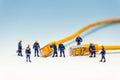 Team of techs with RJ45 network cable Royalty Free Stock Photo