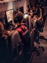 Team of teenage gamers plays in a multiplayer video game on pc in a gaming club. Royalty Free Stock Photo