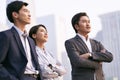 Asian business people talking outdoors Royalty Free Stock Photo