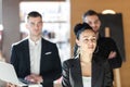 Team of three business people looking forward Royalty Free Stock Photo