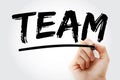TEAM - Timely, Effective, Accurate, Motivate or Together Everyone Achieves More acronym with marker, business concept background Royalty Free Stock Photo