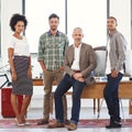 The team to get the job done. Portrait of a diverse group of professionals in an office. Royalty Free Stock Photo