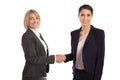 Team: Two isolated businesswoman shaking hands wearing business Royalty Free Stock Photo