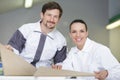 team two painters smiling at camera Royalty Free Stock Photo