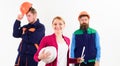 Team of two workmen and woman standing grouped Royalty Free Stock Photo