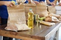 Team of collecting food donations at table, closeup