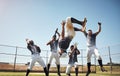 The team who plays together wins together. a group of young baseball players celebrating after winning a game. Royalty Free Stock Photo