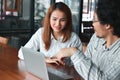 Team work business concept. Young Asian businesspeople working with laptop together in workplace in office Royalty Free Stock Photo