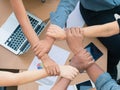 close up of joining hands of businessman in unity