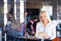 Team work discussing. Open space office and startup crew brainstorming at new project. Young women with paper folder. Royalty Free Stock Photo