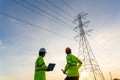 Team work of Engineers and Technician working inspections at the electric power station to view the planning work by producing