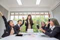 Team work of happy business people cheering in office. Celebrate success. Business team celebrate a good job in the office. Asian Royalty Free Stock Photo