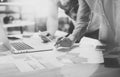 Team work process.Photo young business managers crew working with new startup project.Notebook on wood table, typing Royalty Free Stock Photo