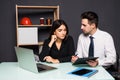 Team work process. Two partners man and women with laptop in open space office. Business concept. Royalty Free Stock Photo