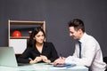 Team work process. Two partners man and women with laptop in open space office. Business concept. Royalty Free Stock Photo