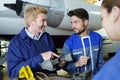 team workers assembling aircraft Royalty Free Stock Photo
