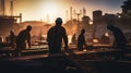 a team of workers at dawn at a construction site