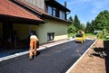 Team of Workers making and constructing asphalt road constructio Royalty Free Stock Photo