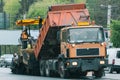 Team of workers in protective uniforms work on road construction. Road works Royalty Free Stock Photo