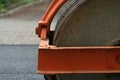 A team of workers on the road during the laying of new asphalt. At the construction site, asphalt laying equipment and workers Royalty Free Stock Photo