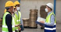 Team workers wear protective face masks for safety industrial factory.