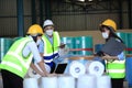 Team workers wear protective face masks for safety industrial factory.