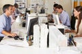 Team Working At Desks In Busy Office Royalty Free Stock Photo