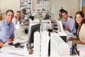 Team Working At Desks In Busy Office Royalty Free Stock Photo