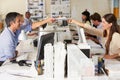 Team Working At Desks In Busy Office Royalty Free Stock Photo