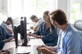 Team Working At Desks In Busy Office. Royalty Free Stock Photo