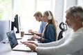 Team Working At Desks In Busy Office. Royalty Free Stock Photo