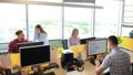 Team working in office. Monitor typing and new project discussing. Royalty Free Stock Photo