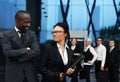 A team of young businesspeople in formal clothes Royalty Free Stock Photo