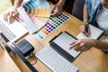 Team of young colleagues creative graphic designer working on color selection and drawing on graphics tablet at workplace, Color Royalty Free Stock Photo