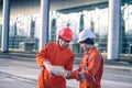 Team of young engineers discussing a construction project