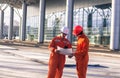 Team of young engineers discussing a construction project