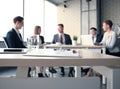 Team young professionals having casual discussion in office. Executives having friendly discussion during break. Royalty Free Stock Photo