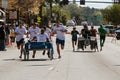 Teams Push Beds On Wheels In Charity Fundraiser Event