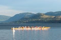 Teams rowing dragon boats on Skaha Lake in Penticton, BC, Canada Royalty Free Stock Photo