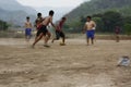 teams of teenage and young boys playing soccer