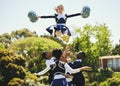 Teamwork, air or girl cheerleader training in fitness workout, exercise or learning routine on field. Jump, dance or Royalty Free Stock Photo