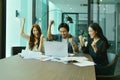 Teamwork of Asian business people succeed a project, tag team Royalty Free Stock Photo